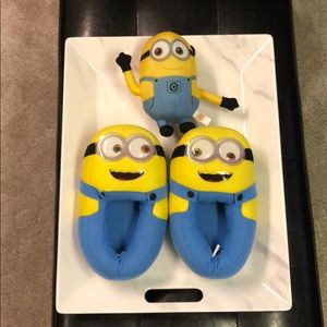 NWOT Minion Slippers and comes with a stuffie!!